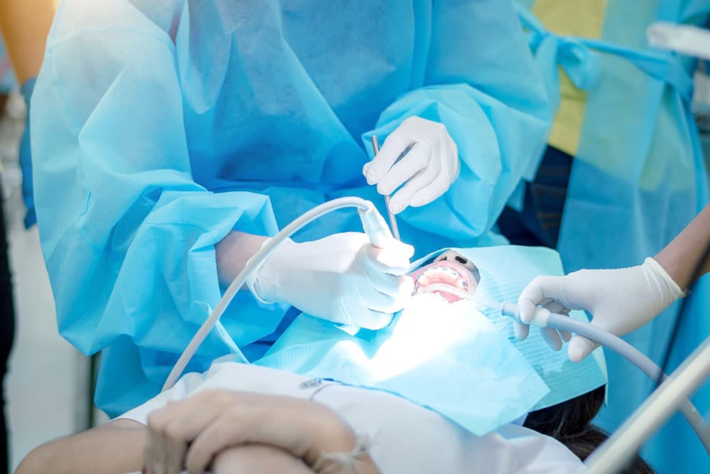 Doctor performing dental care